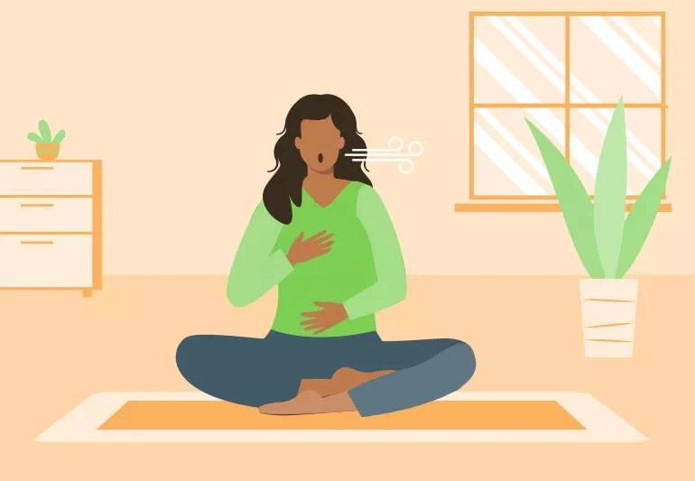 Jak Szybko Zasnąć w 5 Minut? Tajemnica Japońskich Ekspertów od Snu Person sitting cross-legged practicing the 4-7-8 breathing method for relaxation and sleep indoors.