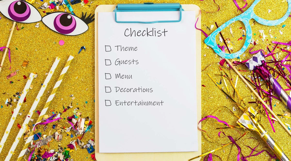 Party planning checklist on clipboard with theme, guests, menu, decorations, and entertainment surrounded by colorful party props and confetti.