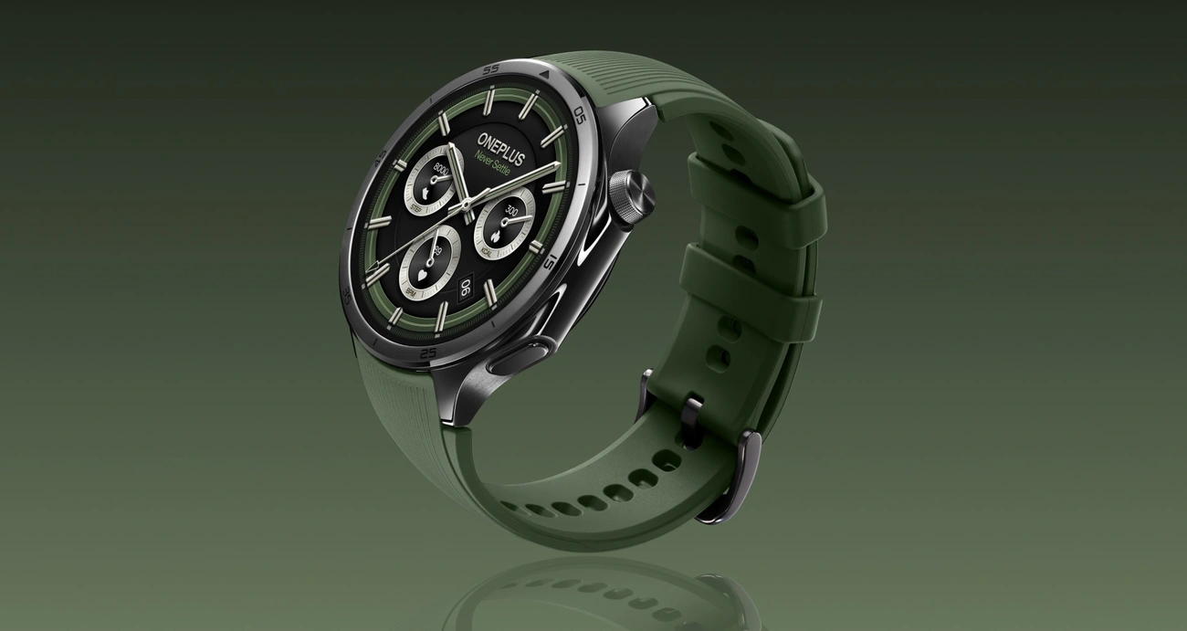 Smartwatch Męski Ranking 2025 | Odkryj 10 Najlepszych! OnePlus Watch 3 with green strap and black round dial displaying multiple fitness tracking features on a green gradient background.
